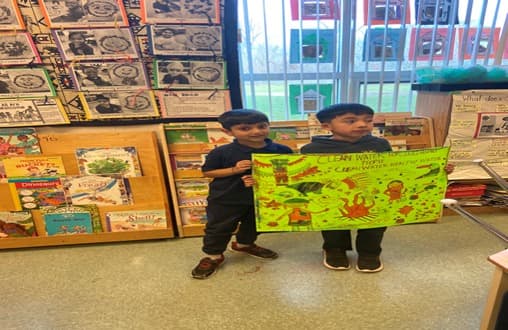 Students with finished poster