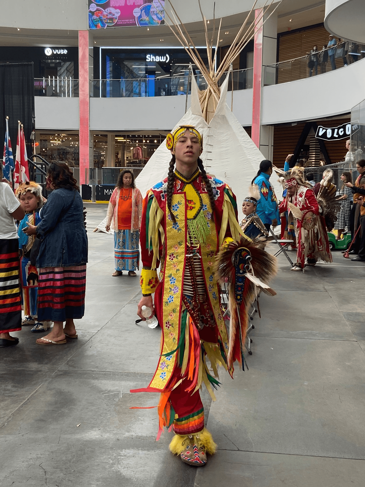 Capturing the vibrant energy of youth in traditional regalia.