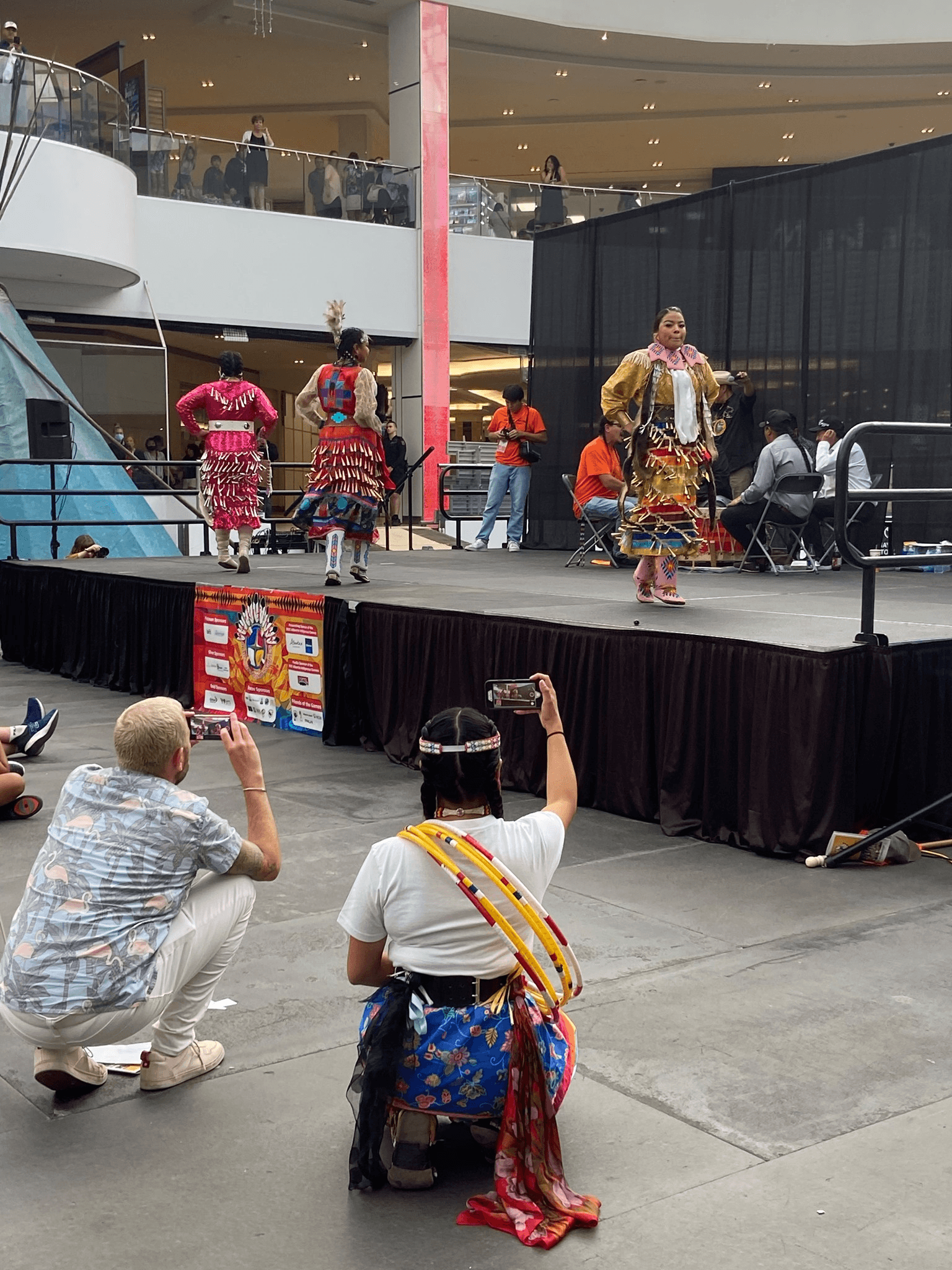 The mesmerizing rhythm of the hoop dance.